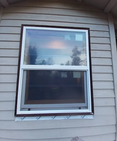 Window Replacement & Hardie Lap siding installation in Benton 